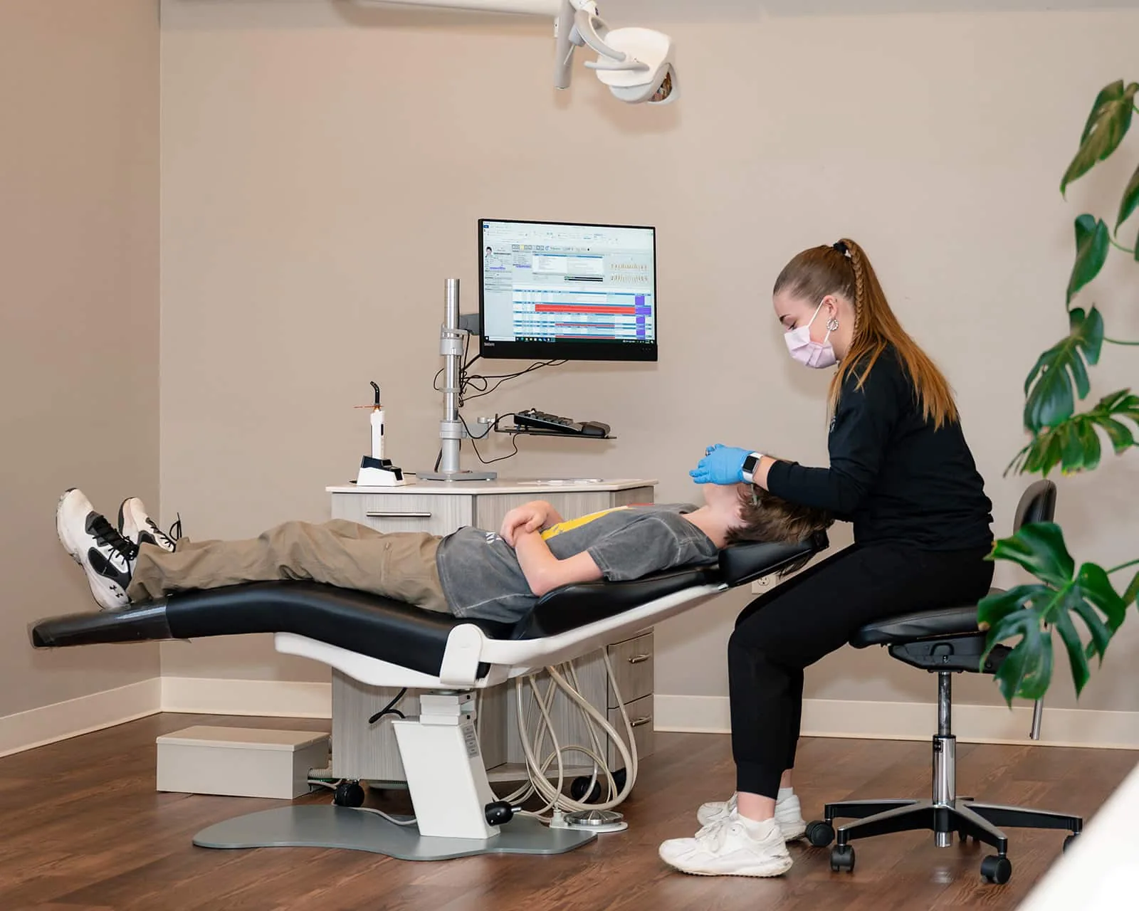 Young patient during a first orthodontic evaluation at Sytek Ortho