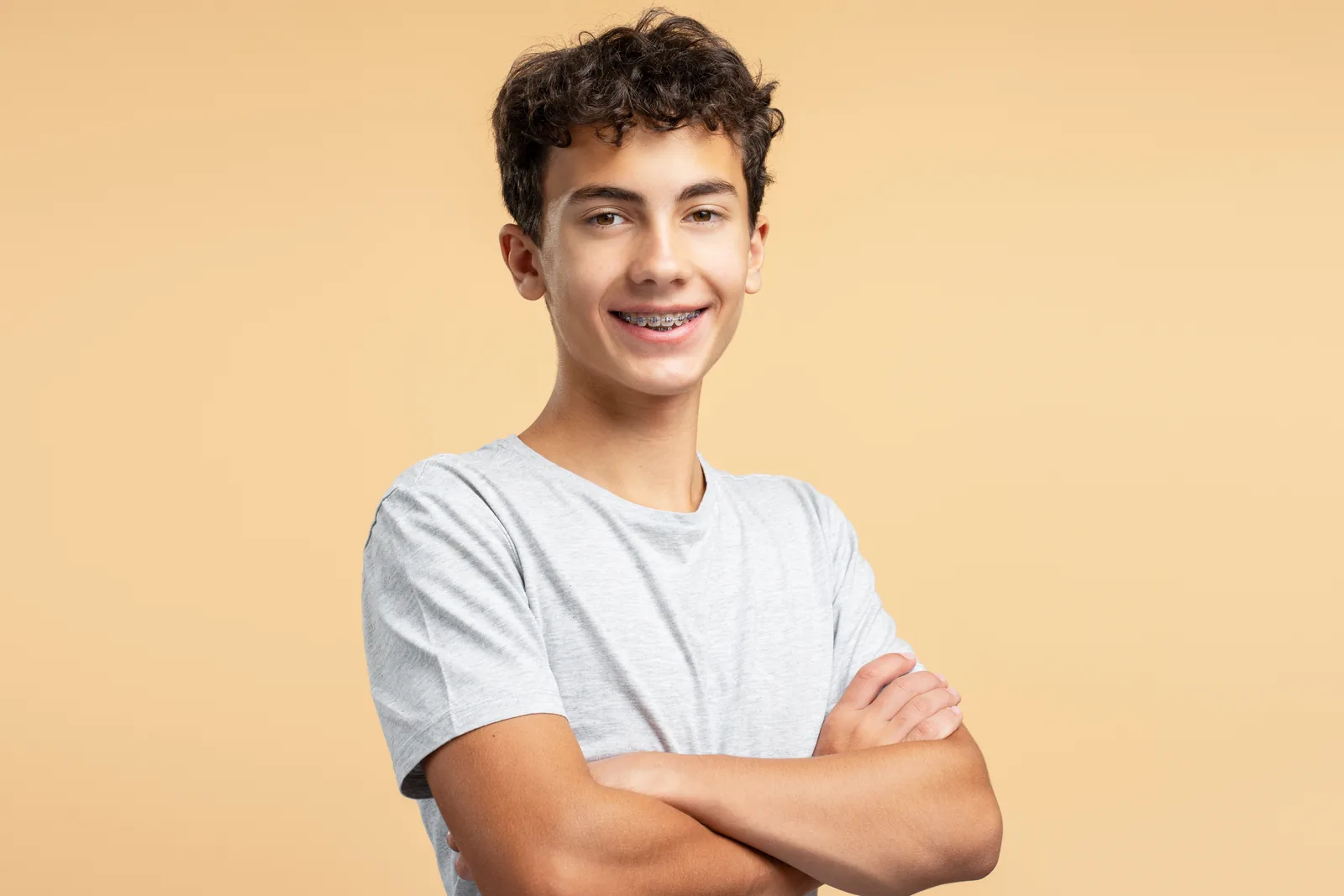 Teen patient with Damon Ultima braces at Sytek Ortho in Alpena, MI